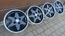 14" WOW alloys 4x100 swift