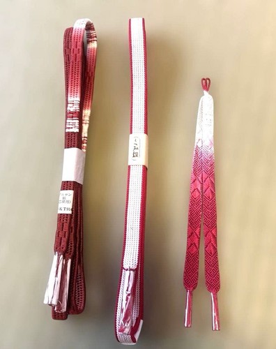 Two obi sashes and - , haori