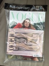 New unopened Vogue magazine December 2025 with pink shoes diary