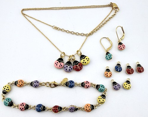 Joan rivers goldtone enamel - joan,