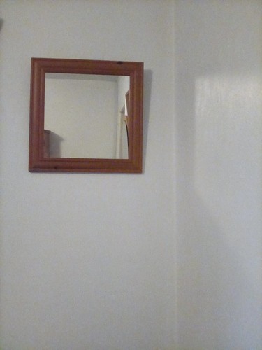 Small mirror with - , wood
