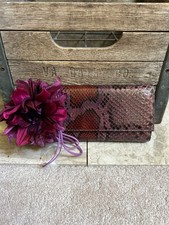 $1139 GUCCI python with flower