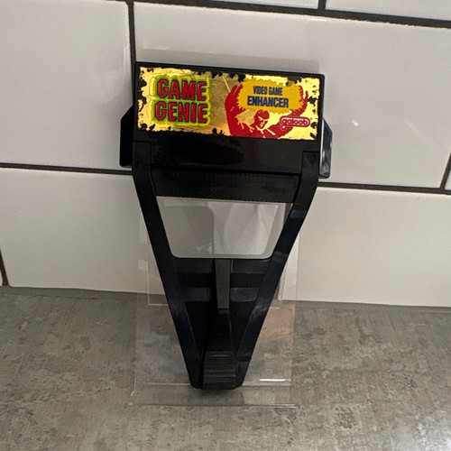Galoob game genie - game,