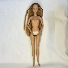 Barbie pregnant minge doll