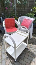 6 White Plastic Garden Chairs (with New  Cushions) And Plastic Drink/Food Table