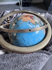large world globe gold and