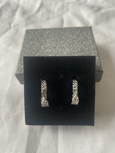 Pretty small silver colour - small,