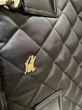 Brown quilted large Burberry bag. large zipped pocket inside & phone pocket.