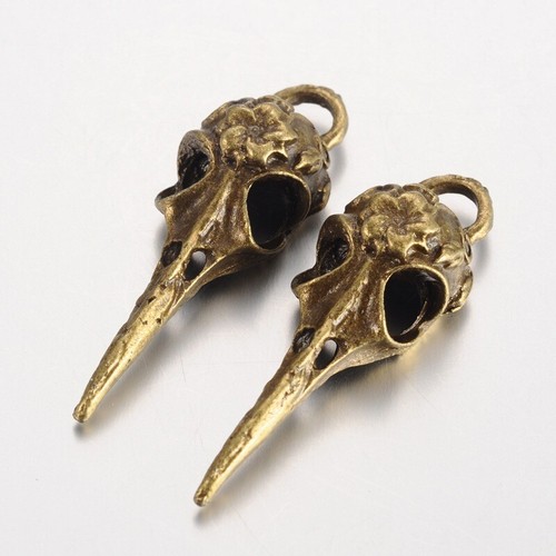 Bird skull charms - charms, tibetan