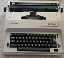 VINTAGE OLYMPIA REPORTER ELECTRIC PORTABLE TYPEWRITER WITH CASE MADE IN JAPAN