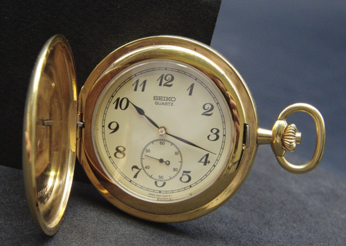 Seiko quartz gold tone case - gold,