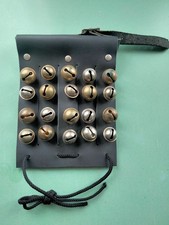 Single black leather bell pad