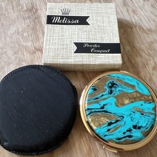 Rate vintage melissa powder