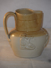 VINTAGE STONEWARE HARVEST JUG WITH EMBOSSED FIGURES OF MEN DRINKING ECT! 14cms