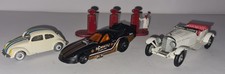 3 Vintage Toy Cars And Petrol Pump