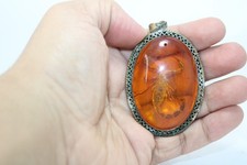 Amber pendent with real - amber,