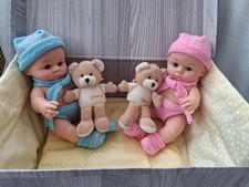 Twin 9" baby dolls with their