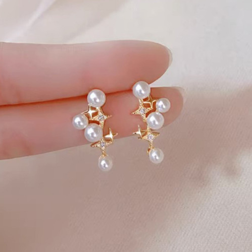 Dainty star pearl stud - star,