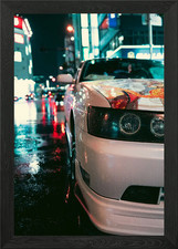car in tokyo street Framed