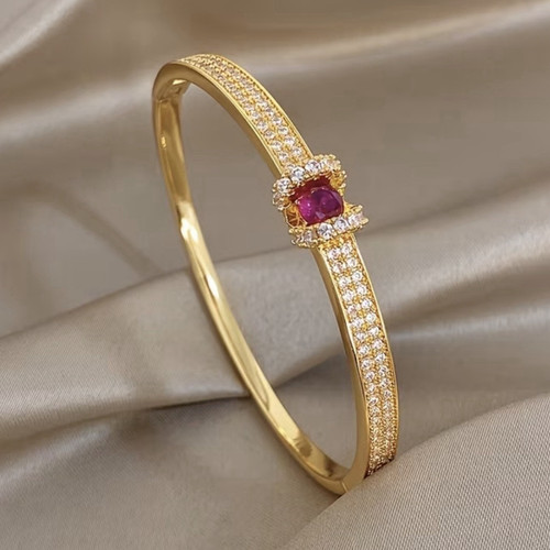 Yellow gold tone bangle - tone,