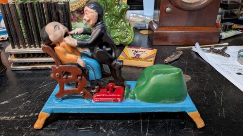 Vintage cast iron the dentist - vintage,
