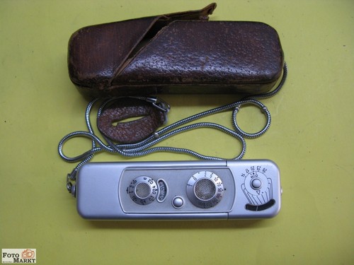 Minox camera 8x11 lens - b,
