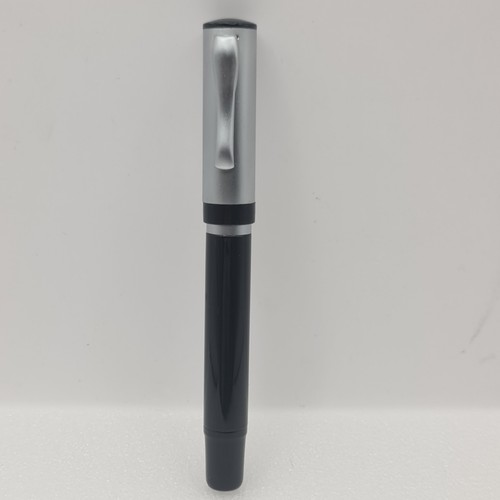 Silver and black fountain pen - and,