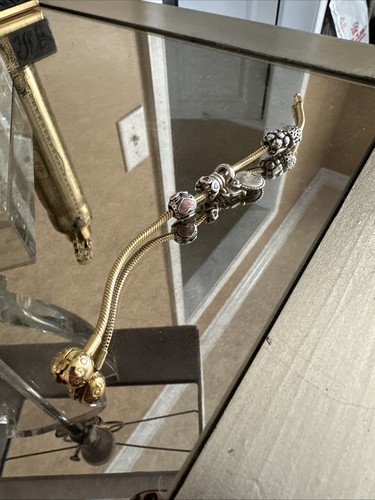 Pandora gold bracelet with - gold,