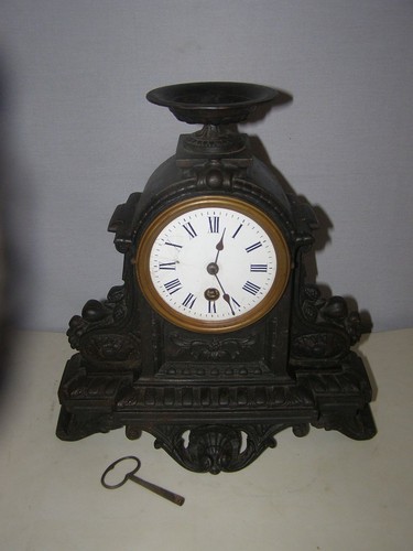 Old metal clock - with, key