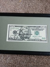us50dollar note signed on both sides by Jack Nicklaus.