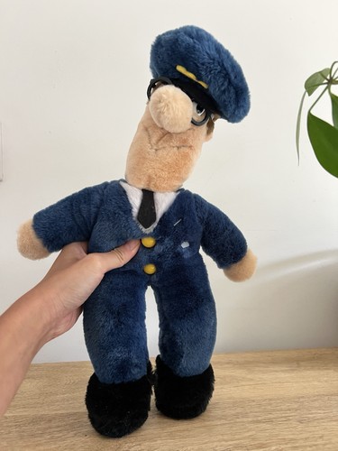 Toyland vintage postman - toyland,