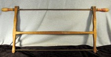 ANTIQUE TURNING BOW SAW, BUCK