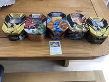 Mystery Pokémon Card Tin with at least 1 Vmax or better. Over 100 cards per tin