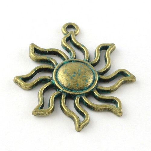 Antique bronze sun charm with - sun,