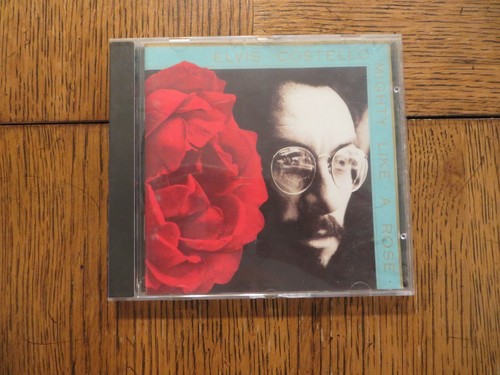 Elvis costello mighty like - costello,
