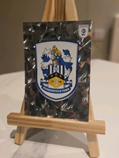 Panini 2025-26 EFL Sticker Collection - #557 Huddersfield Town Club Badge