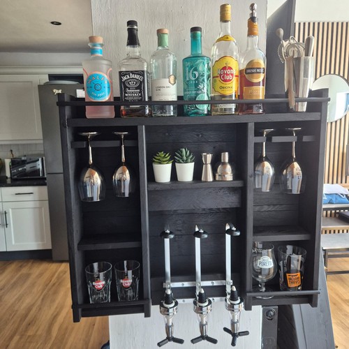 Wall mounted optics bar - mounted,