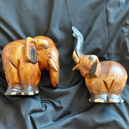 Pair hand carved wooden - of,