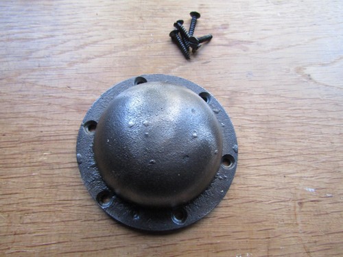 Cast iron shield boss
