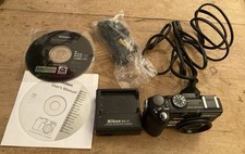 Nikon Coolpix P5100 12.1MP Digital Camera With Battery-Charger-Discs Etc Boxed