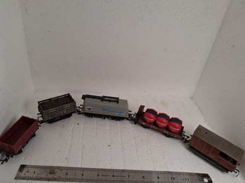 Five model train rolling - five, stock