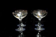 A SET OF FOUR VINTAGE BABYCHAM
