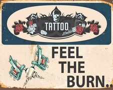 FEEL THE BURN TATTOOIST TATTOO