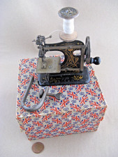 Antique toy sewing machine