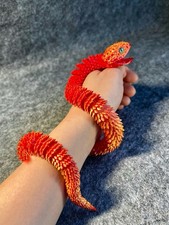Articulated Red And Gold Jaw