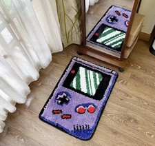 50. Hand-held Game Device