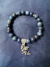 dumortierite beaded bracelet with dragon charm, 6.25"  inner diameter