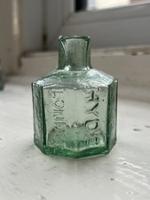 Antique aqua glass advertising