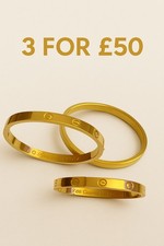 Gold-Tone Screw Bangle |