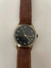 Eastman Electra Manual Wind watch Black Dial Gold Numbers and Hands. Vintage